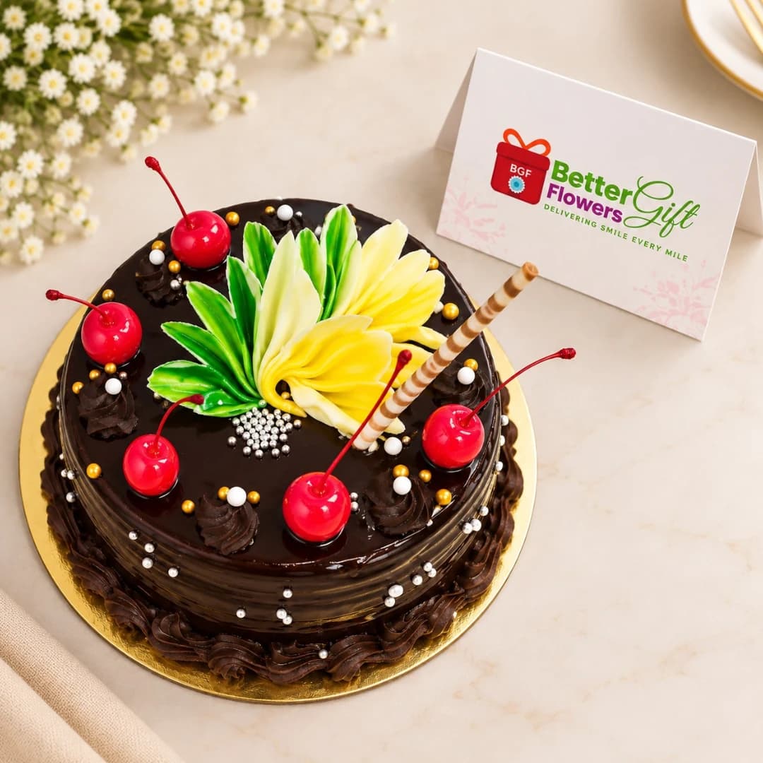 Chocolate truffle cherry cake decorated with chocolate flowers, cherries and wafer sticks