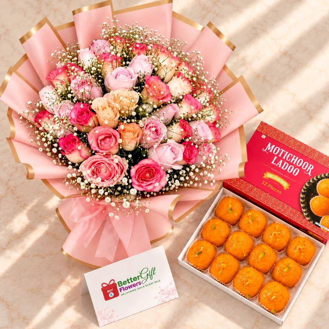 Top view of a pink rose bouquet paired with Motichoor Ladoos in a red decorative sweets box.