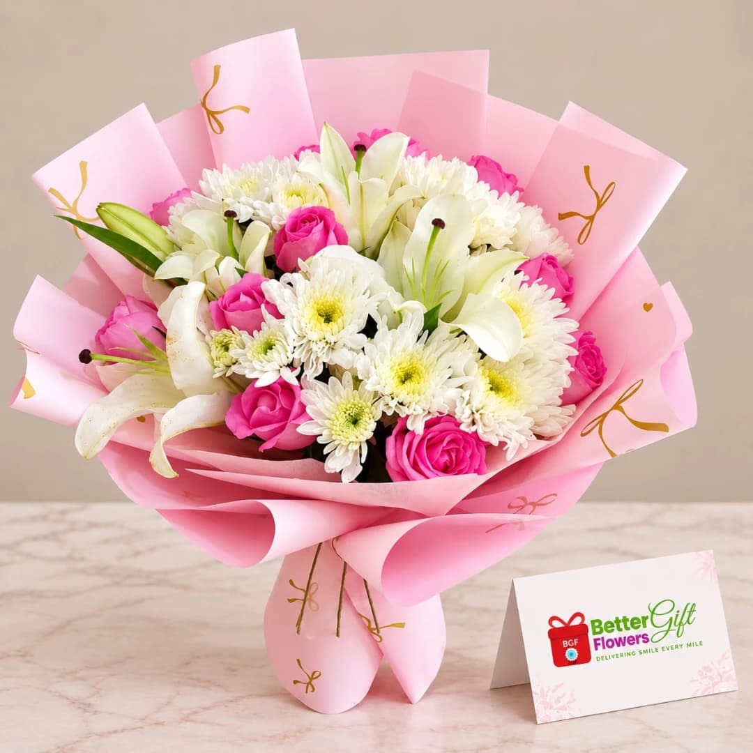Pink rose, white lily and chrysanthemum bouquet in pink wrapping