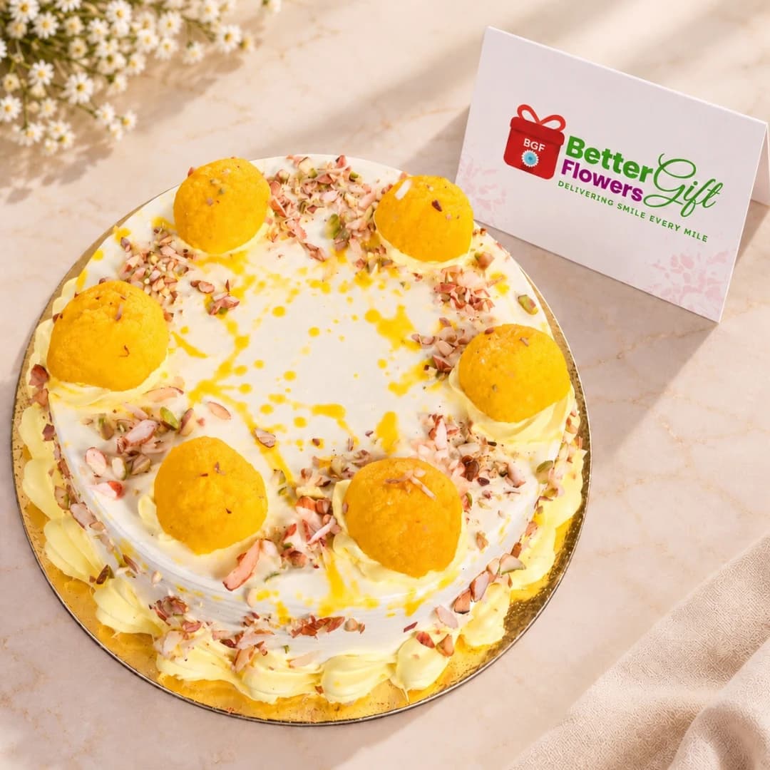 Almond rasgulla cake with saffron drizzle and rasgulla topping