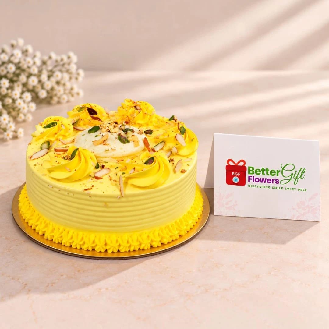 Rasmalai cake decorated with rasmalai, pistachios and almond flakes