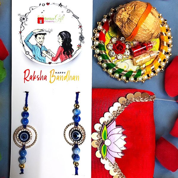 Evil eye rakhi combo featuring 2 rakhis, 1 roli chawal set, and rakhi pouch