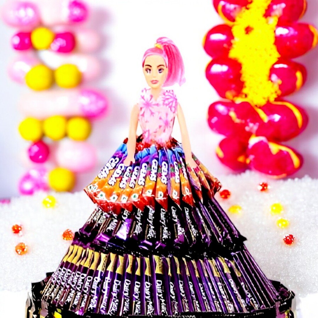 Close-up of A Chocolate Doll crafted with Cadbury Dairy Milk by BetterGiftFlowers.