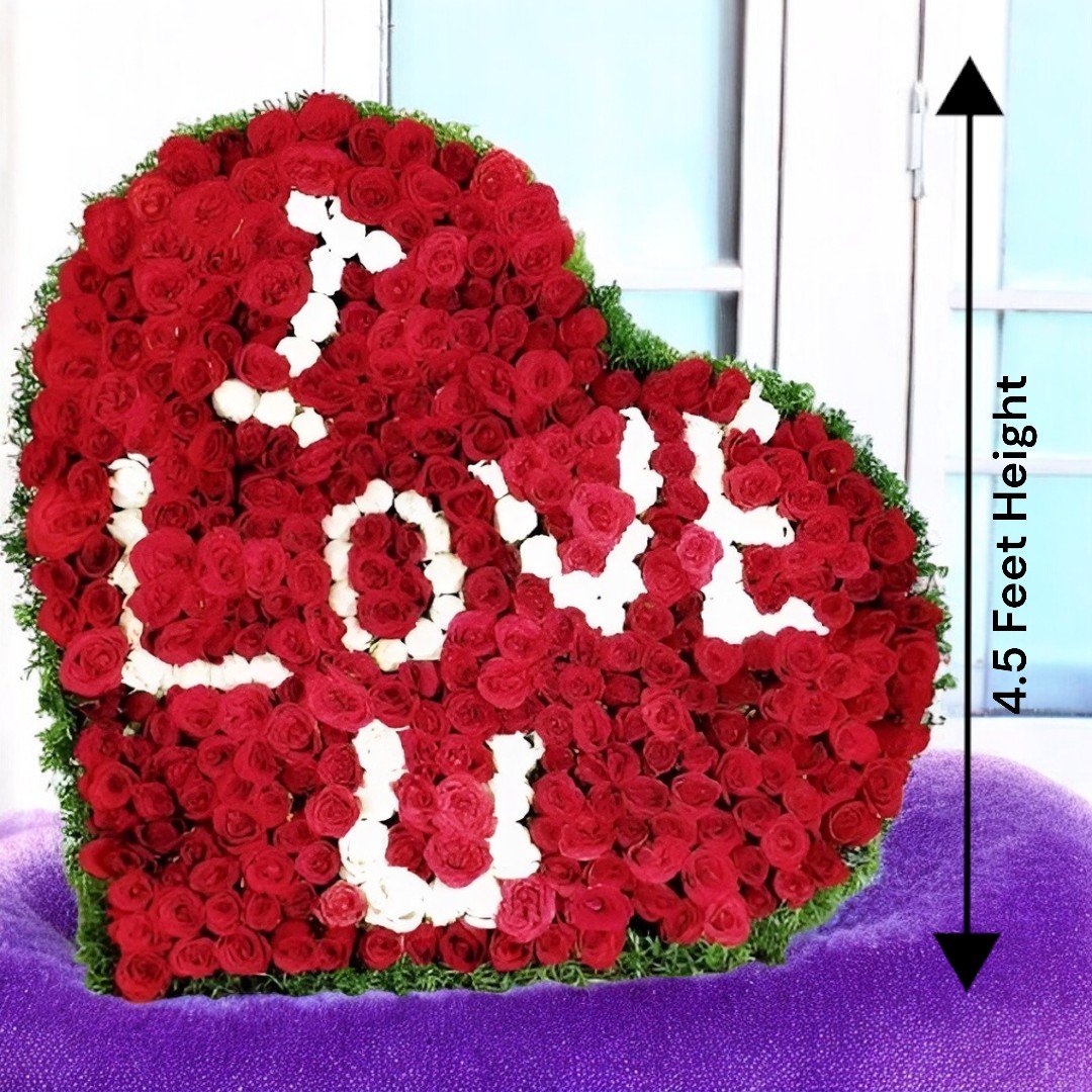 4.5-feet tall heart-shaped rose arrangement with "I Love U" message, designed by Better Gift Flowers.