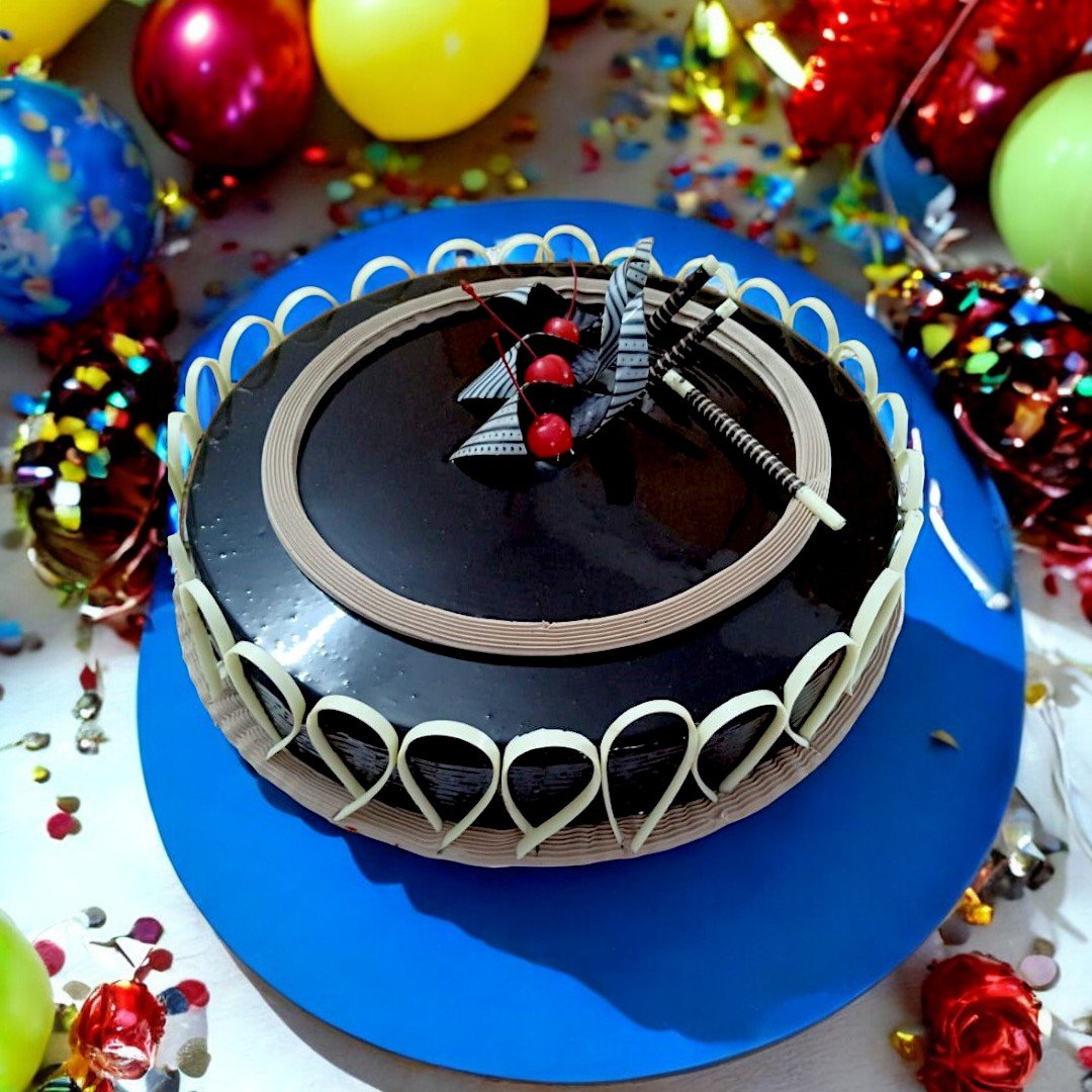 Chocolate Elegance Cake surrounded by festive decorations from BetterGiftFlowers