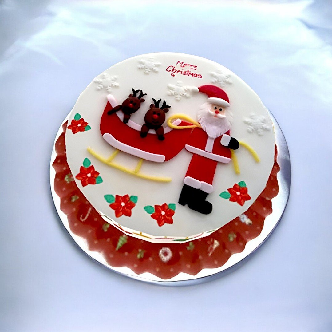 Festive-themed Santa and reindeer Christmas Cake - BetterGiftFlowers.