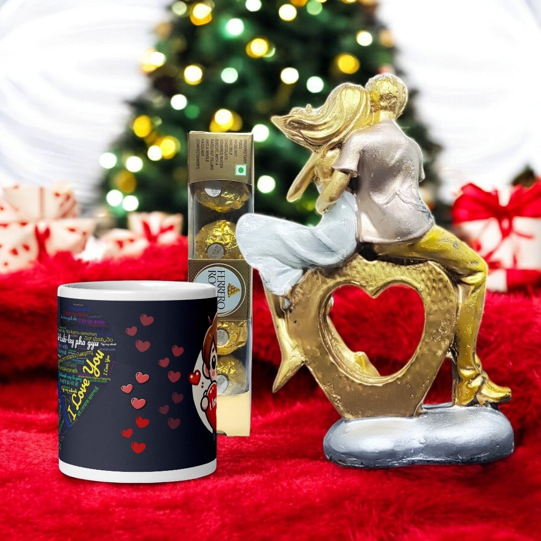 Better Gift Flowers love-themed gift combo featuring a ceramic mug, Ferrero Rocher chocolates, and a golden couple figurine perfect for special occasions.