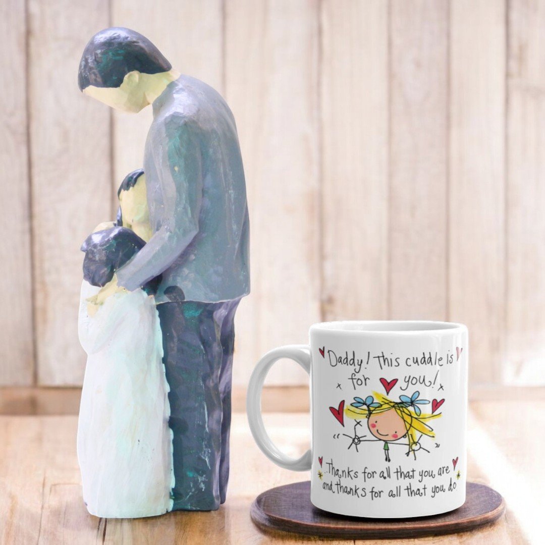 Father's Day combo from BetterGiftFlowers featuring a ceramic mug and father-child showpiece.