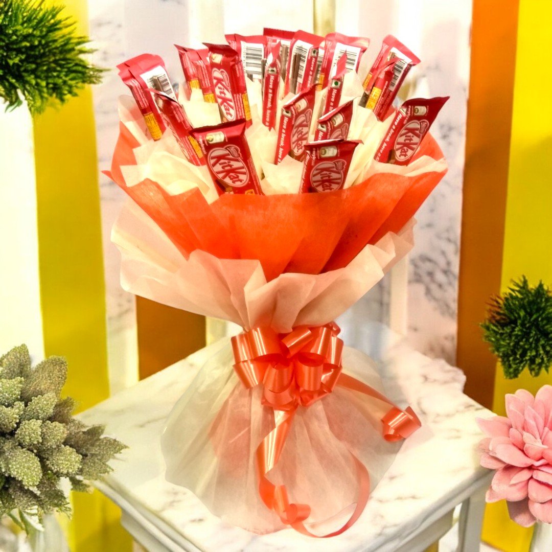 A stunning arrangement of KitKat chocolates in a bouquet by BetterGiftFlowers, perfect for gifting.