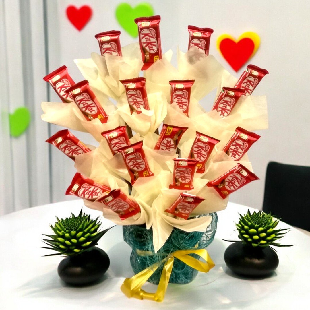 Kitkat bouquet from BetterGiftFlowers with 20 Kitkat chocolates, displayed on a table.