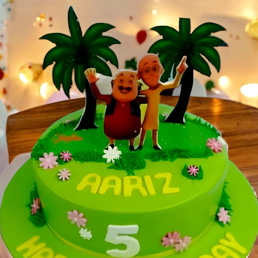 BetterGiftFlowers Motu Patlu cake close-up showing characters and birthday decorations with Aariz name.