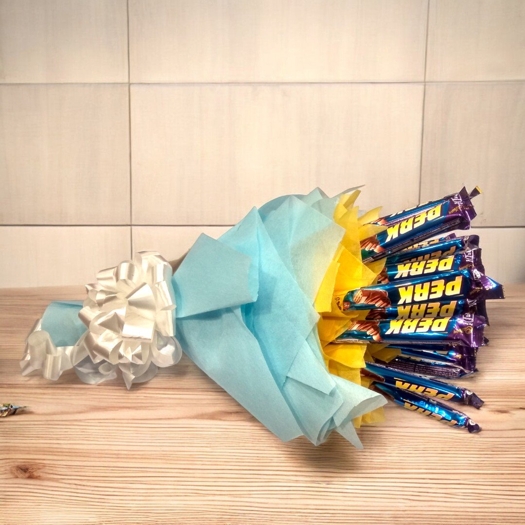 Side view of Perk Chocolate Bouquet from BetterGiftFlowers with 15 Perk chocolates, beautifully arranged.