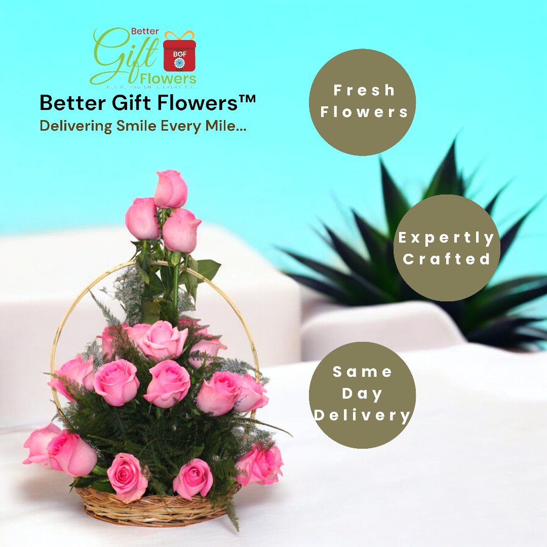 Fresh pink roses arranged in a basket with lush greenery and a teddy bear from BetterGiftFlowers, available for same-day delivery.