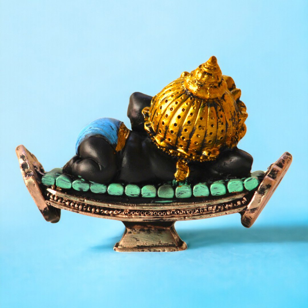 Back view of the Relaxing Ganesha Showpiece on a decorative stand by BetterGiftFlowers