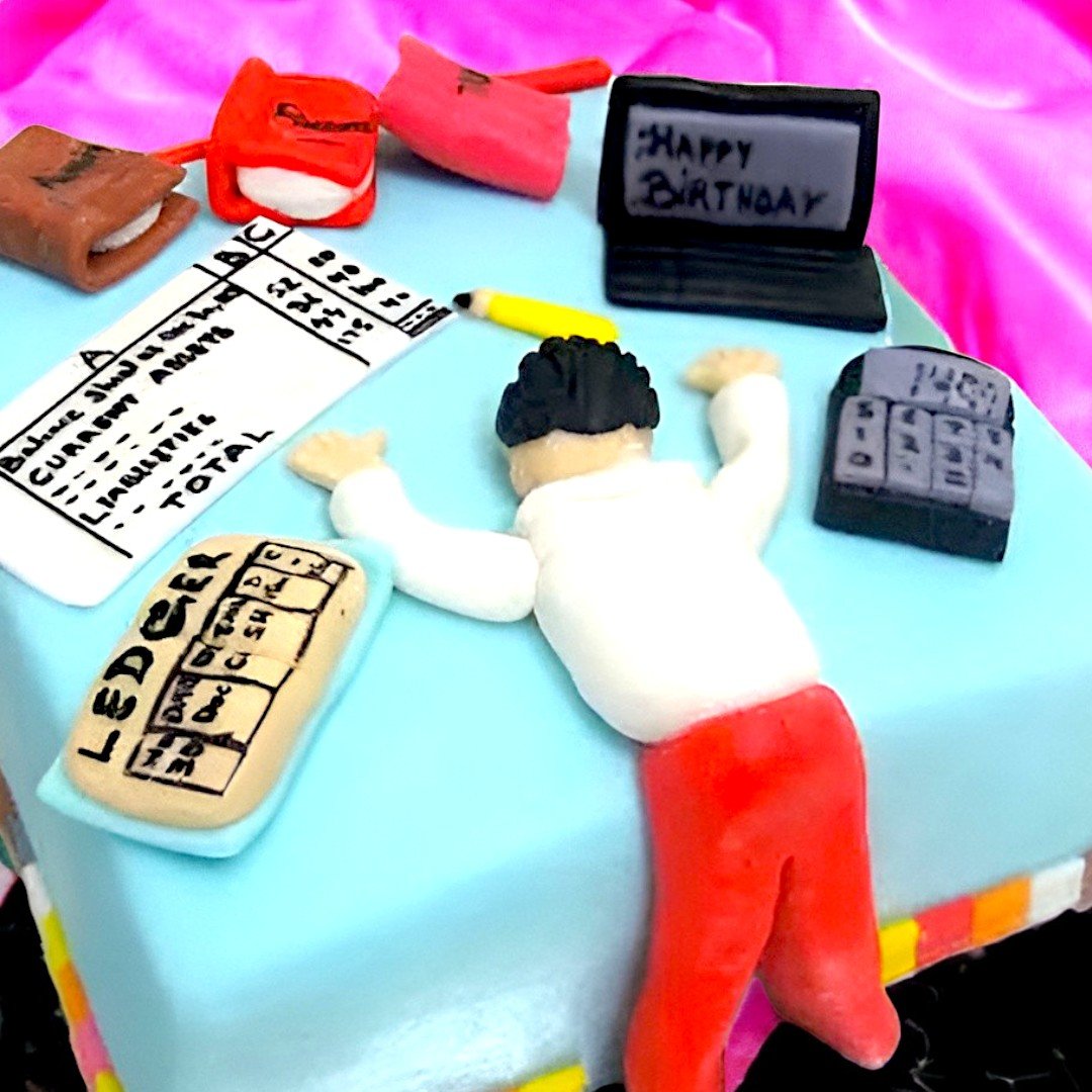 Close-up of workaholic cake with detailed office-themed decorations, from BetterGiftFlowers