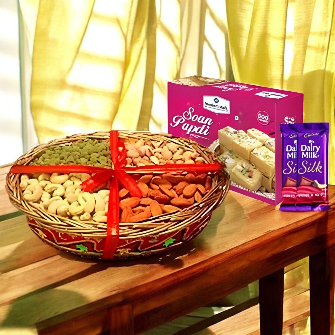 A Festive Combo featuring dry fruits basket, Soan Papdi, and Dairy Milk Silk chocolates from BetterGiftFlowers.