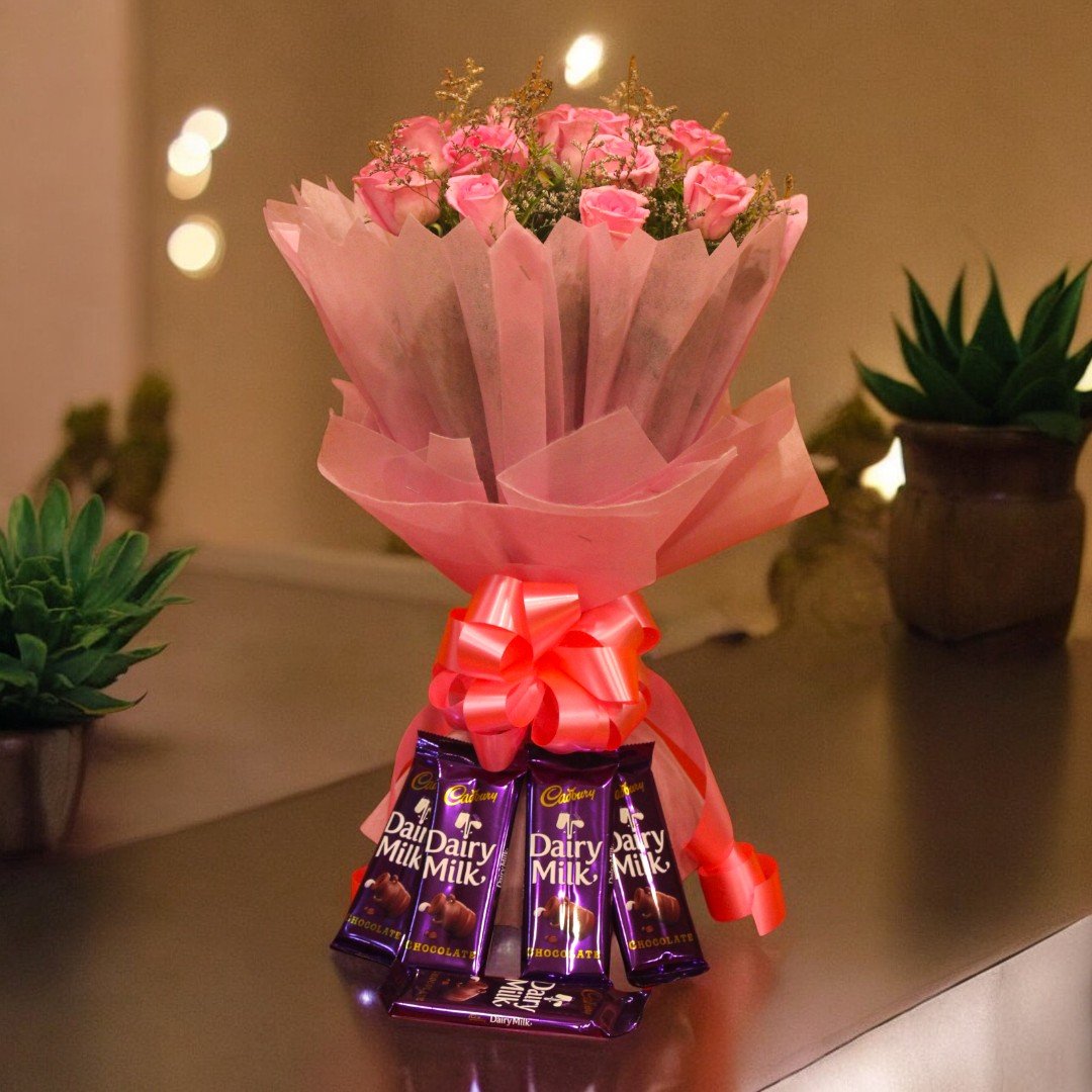 BetterGiftFlowers pink rose bouquet with Dairy Milk chocolates arranged in a heartfelt combo