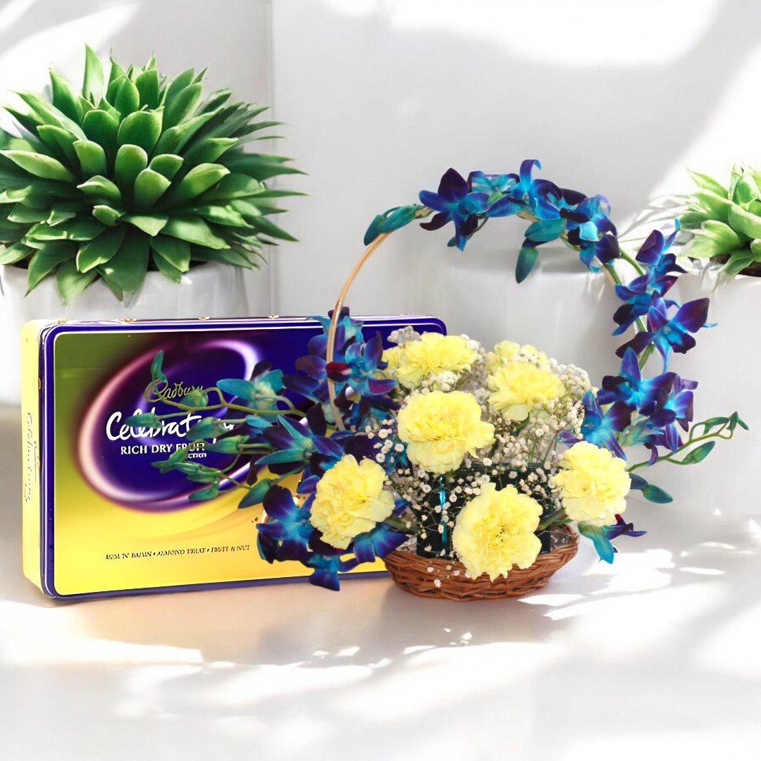 BetterGiftFlowers basket of orchids and carnations with Cadbury Celebrations dry fruit box.