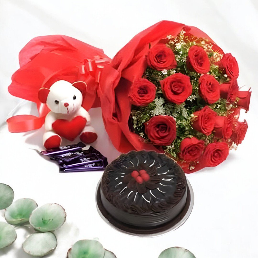 A beautiful red rose bouquet, teddy bear, chocolates, and chocolate cake from Better Gift Flowers combo set.