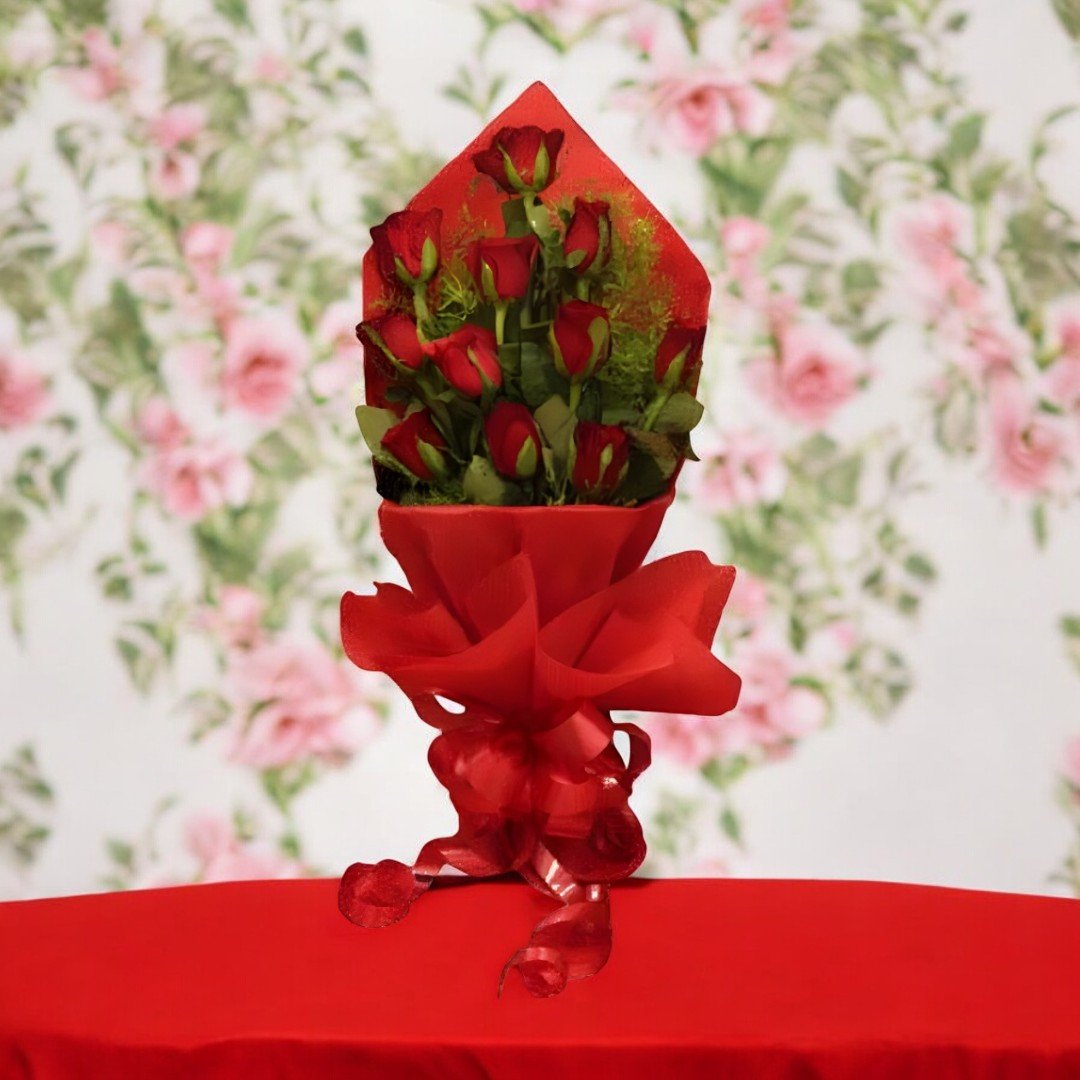 BetterGiftFlowers Awesome Red Bunch of 12 red roses wrapped in vibrant red packaging.