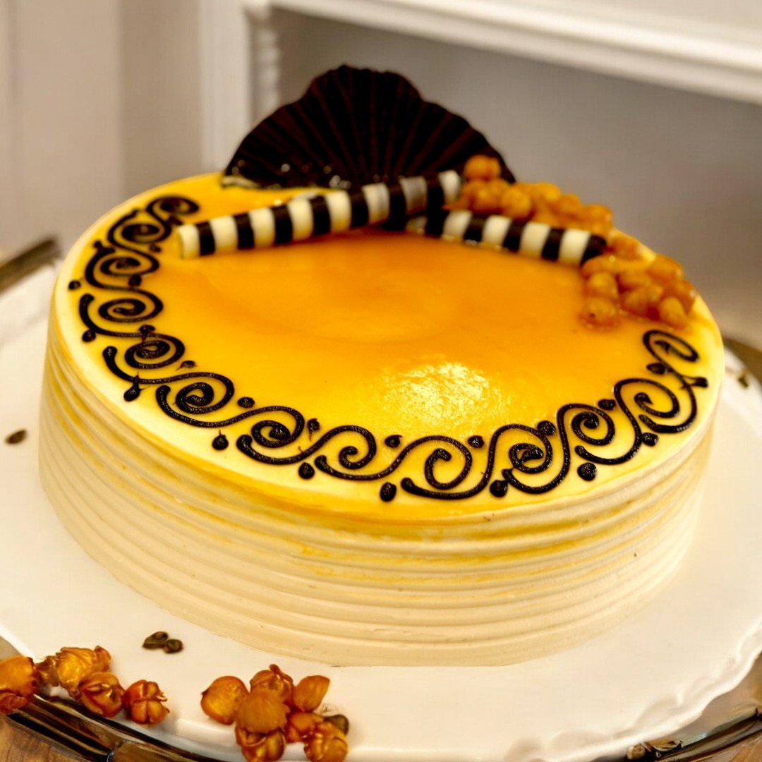 Freshly baked Butterscotch Cake with elegant decoration from BetterGiftFlowers.