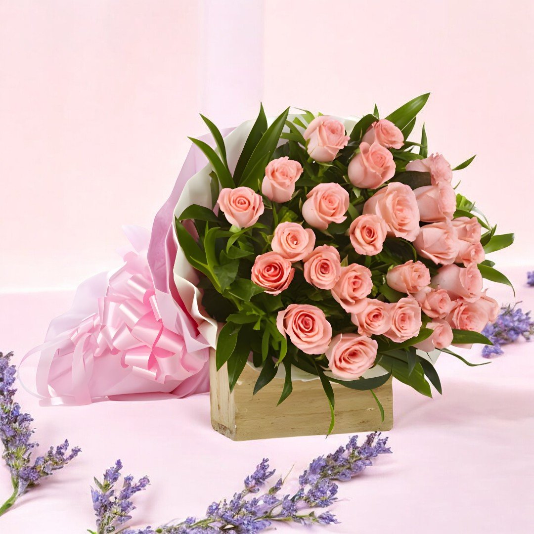 A beautiful bouquet of 25 pink roses wrapped elegantly by Better Gift Flowers.