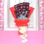 Dairy Milk Bunch of 10 chocolates beautifully wrapped in vibrant red and blue packaging by Better Gift Flowers.