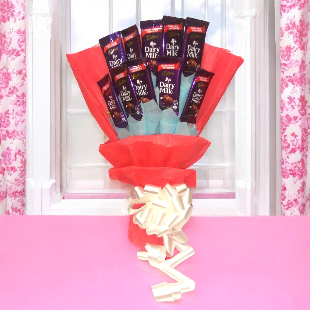 Dairy Milk Bunch of 10 chocolates beautifully wrapped in vibrant red and blue packaging by Better Gift Flowers.