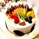 Delicious Fruit Cake topped with fresh fruits by Better Gift Flowers