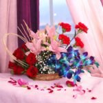 A luxurious floral basket arrangement of roses, orchids, carnations, and lilies by Better Gift Flowers, showcasing vibrant colors and artistic design.