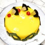 Top view of BetterGiftFlowers' Pineapple Cake with cherries and pineapple pieces.