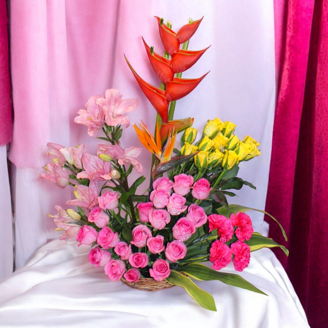 Spread A Charm premium flower arrangement with pink and yellow roses by Better Gift Flowers