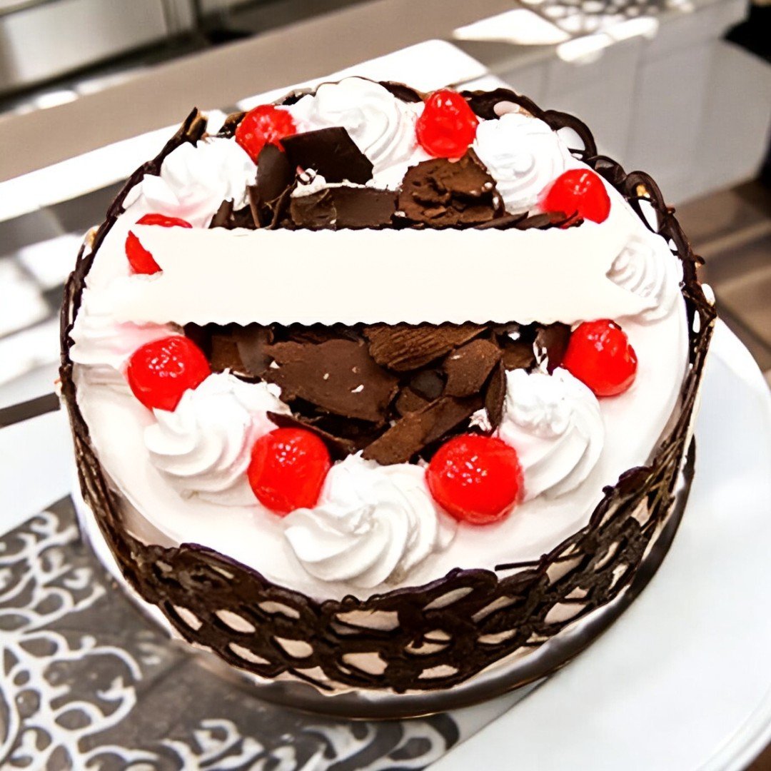 Yummy Black Forest Cake topped with cherries and chocolate from Better Gift Flowers