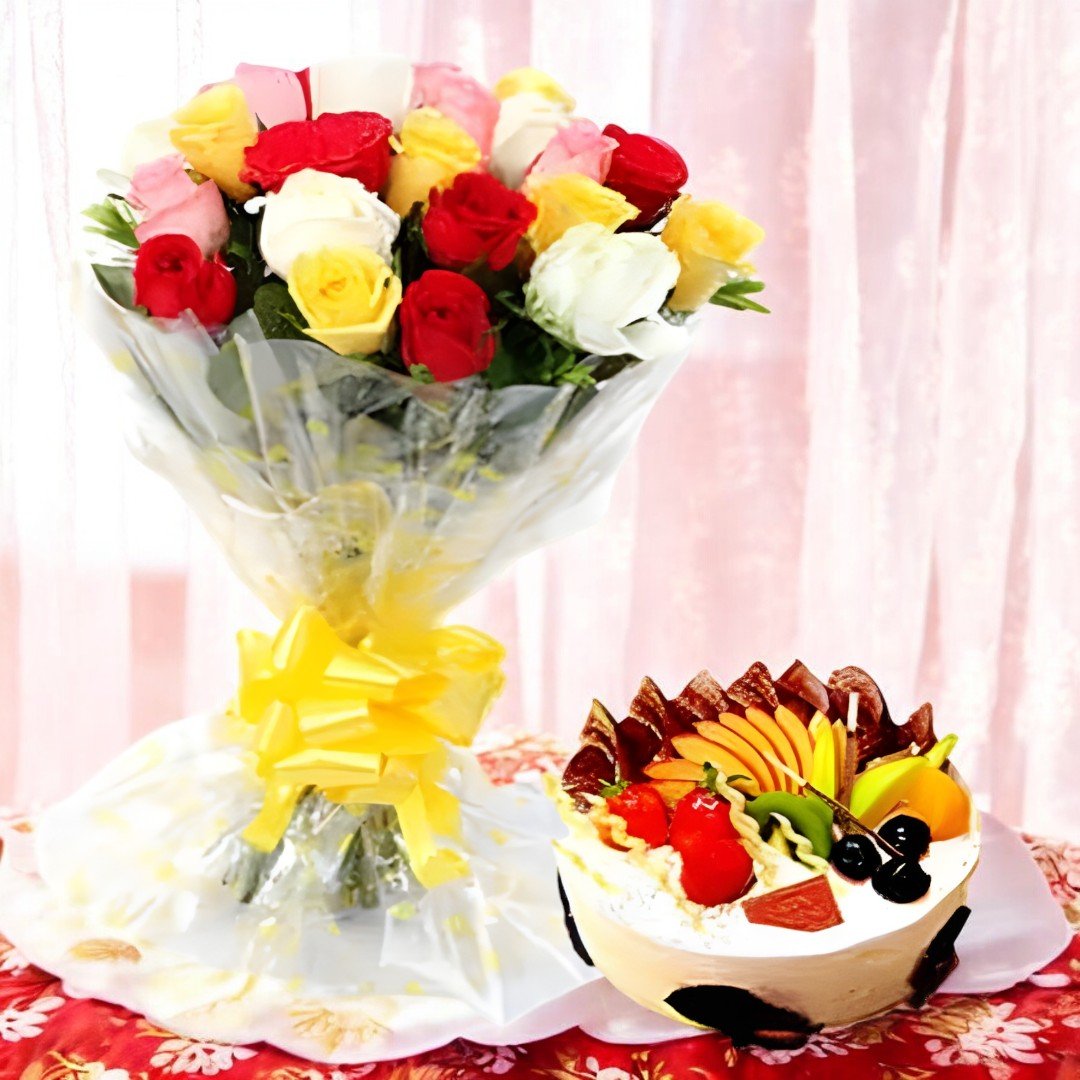 BetterGiftFlowers vibrant mix of roses bouquet paired with a delectable fruit cake.