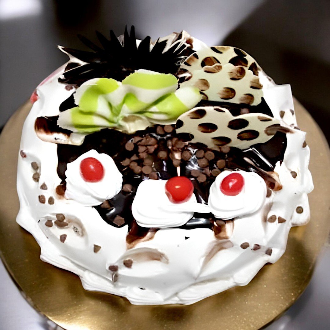 Delicious Chocochips Cake by Better Gift Flowers with smooth cream and crunchy chocolate chips topping.