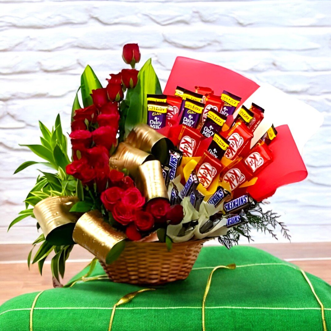 A Special Gift Hamper by BetterGiftFlowers featuring red roses with KitKat, Dairy Milk, and Snickers chocolates.