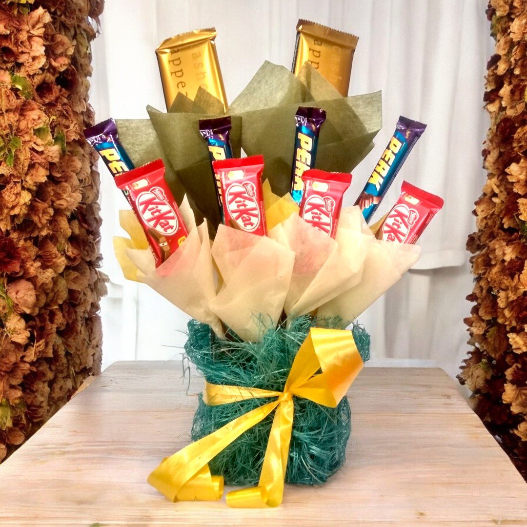 A Sweet Treat chocolate bouquet with KitKat, Perk, and Cashew chocolates by BetterGiftFlowers