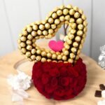 Heart-shaped Chocolate Bounty with 110 Ferrero Rocher and roses by BetterGiftFlowers.