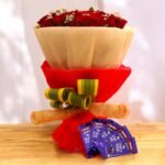 BetterGiftFlowers Roses N Dairy Milk bouquet featuring fresh red roses and Dairy Milk chocolates.