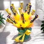 Better Gift Flowers Tempting Choco Hamper with Perk and 5 Star Chocolates in a Jute-Covered Vase