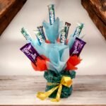 Tempting Chocolate Hamper with Bounty, Dairy Milk, and Snickers by BetterGiftFlowers.