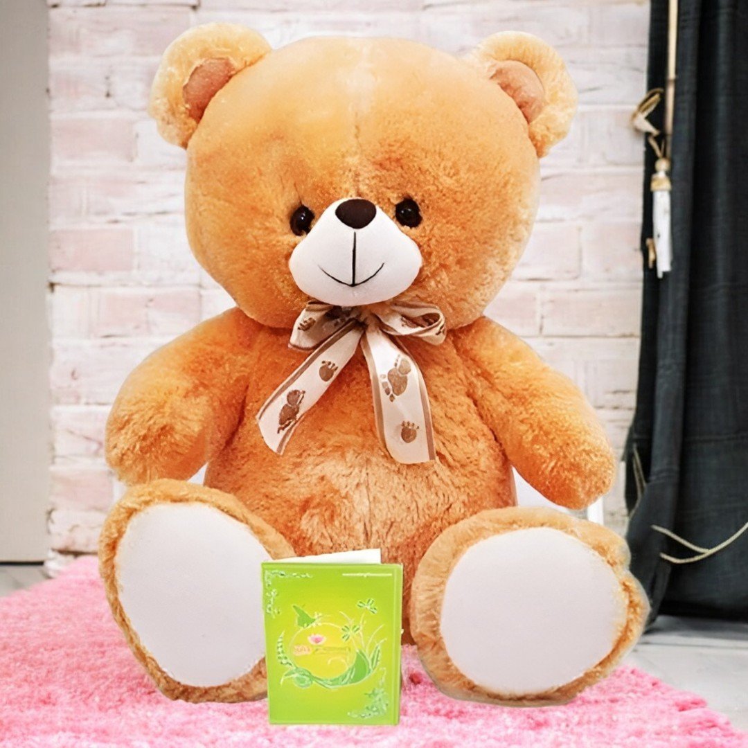 A soft, 12-inch teddy bear with a bow, perfect for gifting from BetterGiftFlowers.