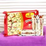 Haldiram’s Soan Papdi with three Rakhis - BetterGiftFlowers Rakhi combo.