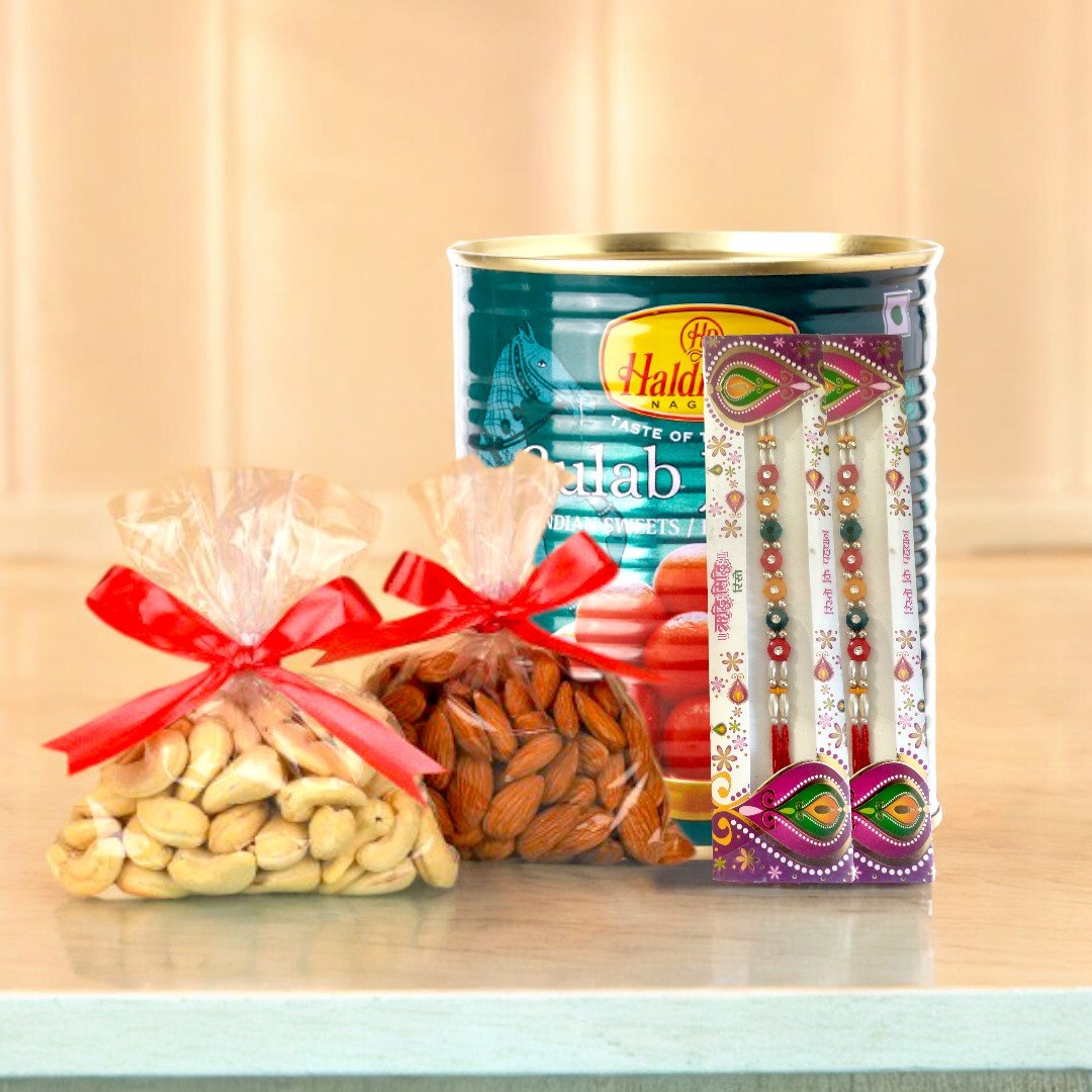 BetterGiftFlowers Sweets Rakhi N Dry Fruits combo with Haldiram's Gulab Jamun, almonds, cashews, and two Rakhis.