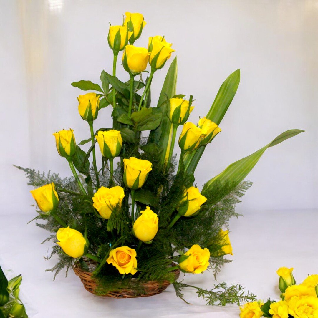 Basket of yellow roses from BetterGiftFlowers, beautifully arranged with lush greenery, perfect for gifting on any occasion.