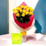 Enticing Yellow Rose Bouquet by BetterGiftFlowers in vibrant red and white wrapping