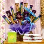 Better Gift Flowers Mix Chocolates Rakhi Combo with assorted chocolate bouquet and two Rakhis