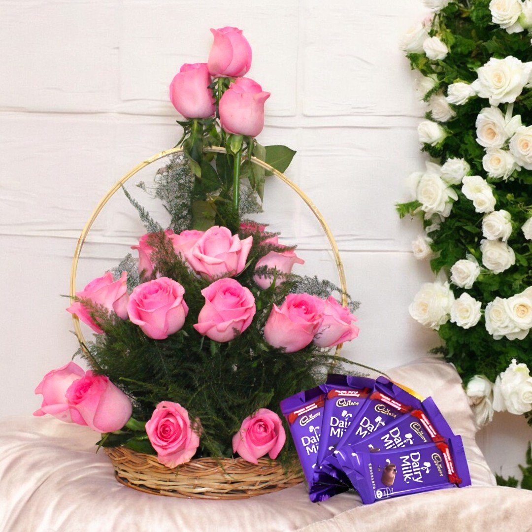 Basket of fresh pink roses with Dairy Milk chocolates - BetterGiftFlowers