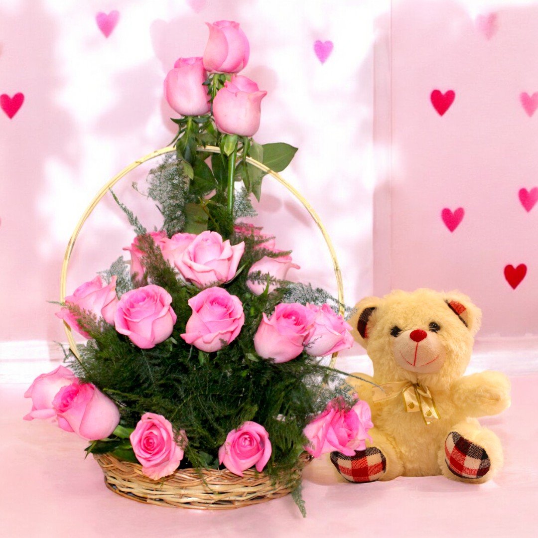 Pink roses basket arrangement with a cute teddy bear from BetterGiftFlowers, perfect for romantic or special occasions.