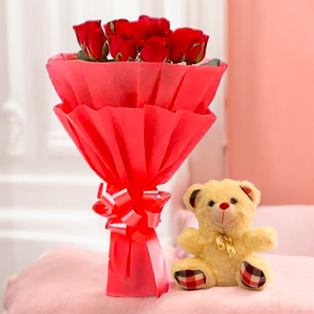 Image of a "Red Rose Bouquet N Teddy" by BetterGiftFlowers, featuring fresh red roses in a vibrant red wrapping and a cute, soft teddy bear.